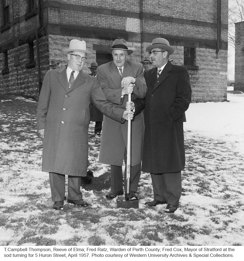 Black and white photograph pf T.Campbell Thompson, Reeve of Elma; Fred Ratz, Warden of Perth County; Fred Cox, Mayor of Stratford at the sod turning for 5 Huron Street, April 1957.