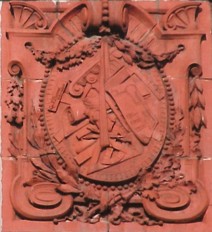 Colour photograph of the terra cotta tile with George F. Durand's signature